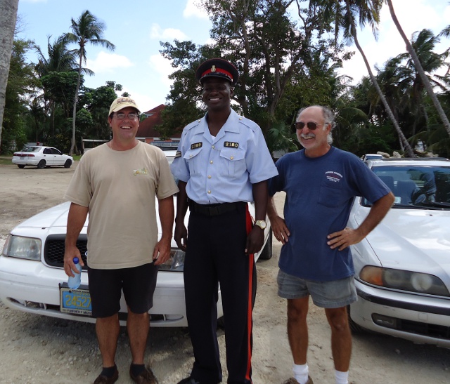 Brian, Pierre and police officer that escorted us around town.