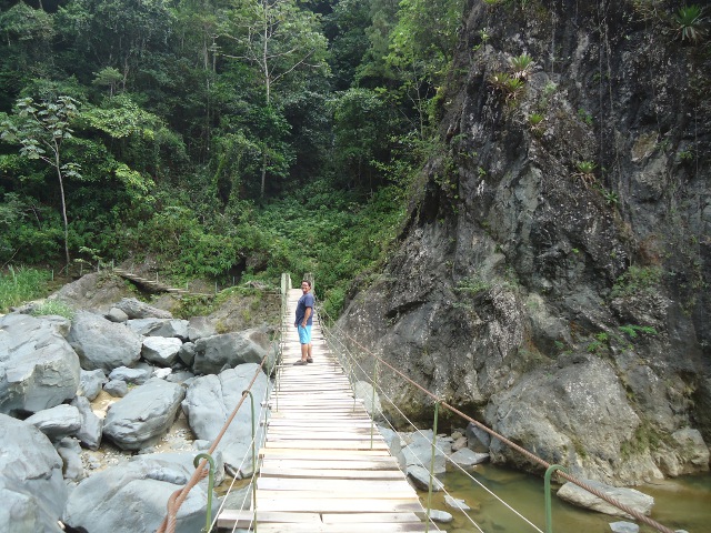 Brian on one of the many suspension bridges leading to Salto de Jimenoa Dos