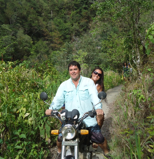 All smiles riding back from the Salto de Baiguate Waterfall
