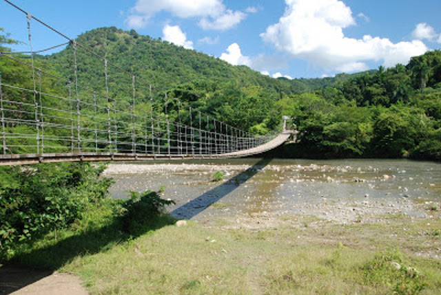 The first step of our journey was to cross this swing bridge to get to the falls.