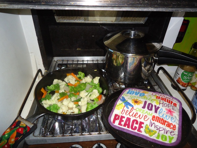 Yum, making veggies and brown rice!