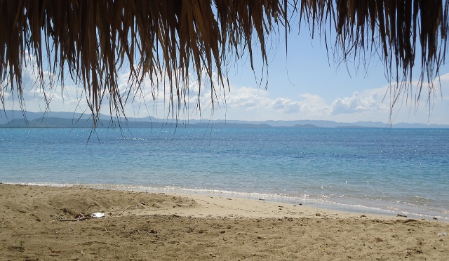 Enjoying the beach and mountain views on La Playa Castillo